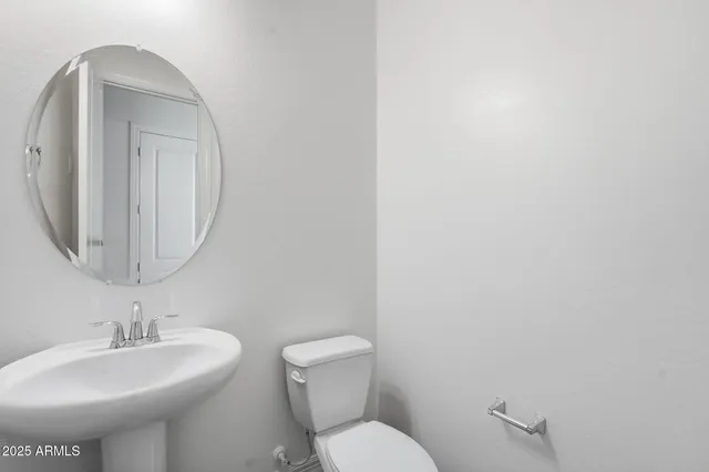 a view of a lake with houses in the back