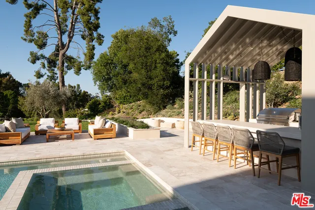 a view of a building with sitting area