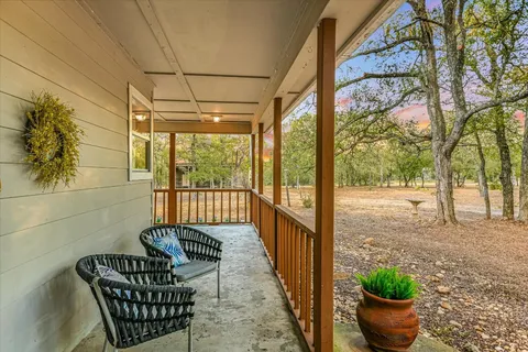 a view of a porch with furniture