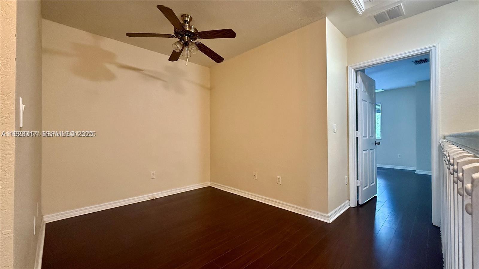 1918 Alamanda Way Riviera Beach, FL 33404 - Photo 11 of 23 a view of empty room with wooden floor