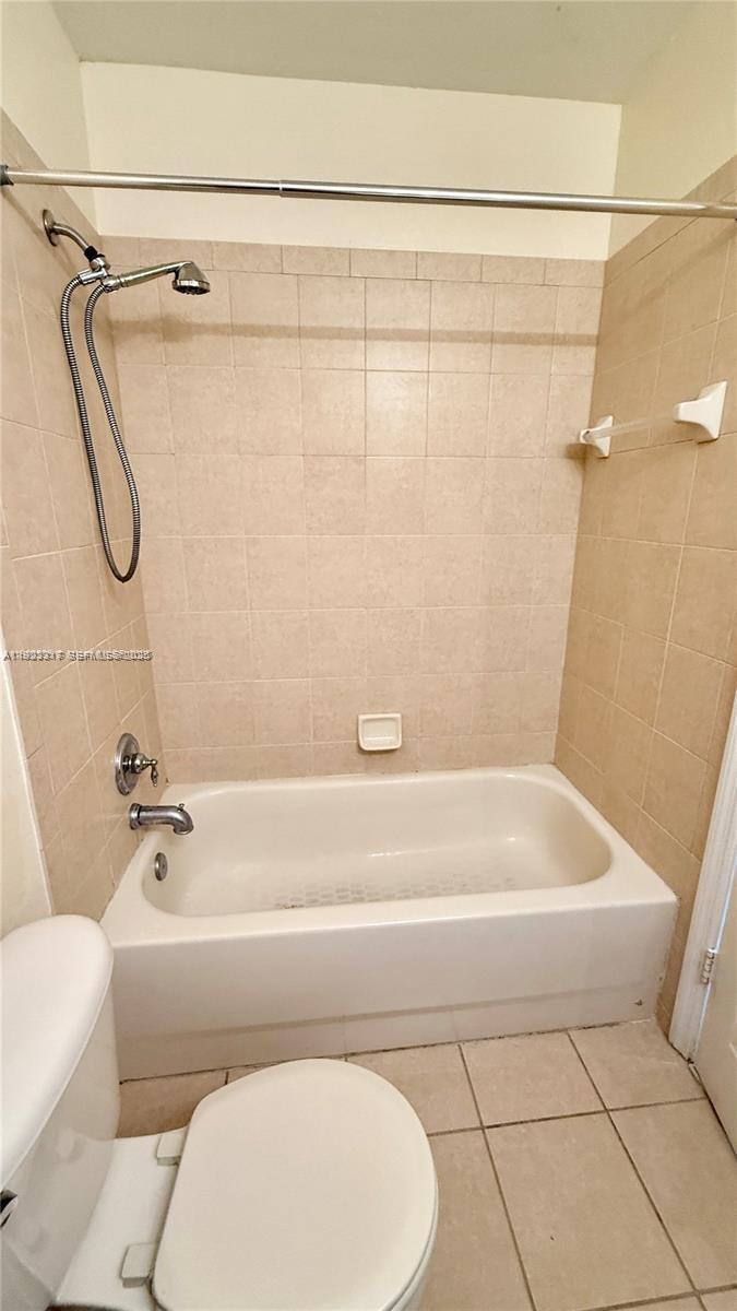 1918 Alamanda Way Riviera Beach, FL 33404 - Photo 16 of 23 a bathroom with a bathtub and a shower