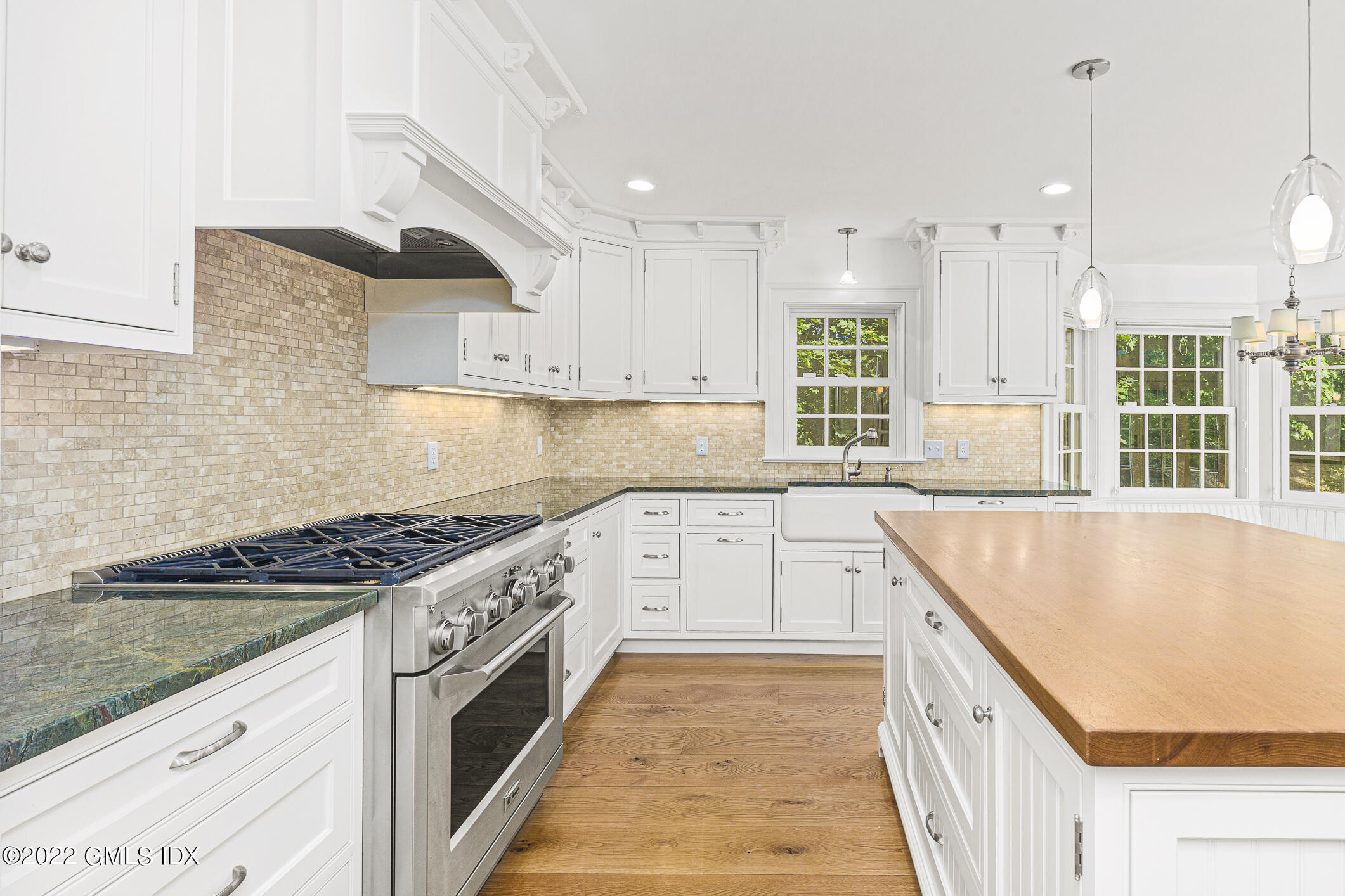 65 Doubling Road Greenwich, CT 06830 - Photo 9 of 18 a kitchen with stainless steel appliances granite countertop a stove and a sink