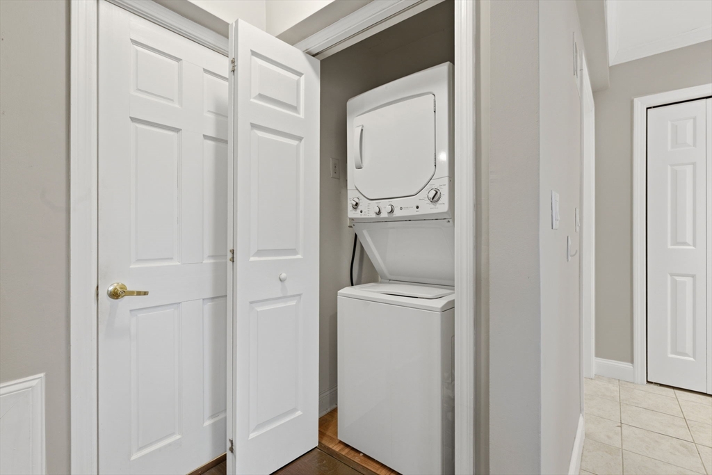 27 Commonwealth Avenue, Unit 1 Newton, MA 02467 - Photo 14 of 18 a bathroom with a toilet and a sink