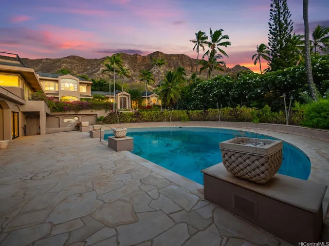 a view of a terrace with a table and chairs