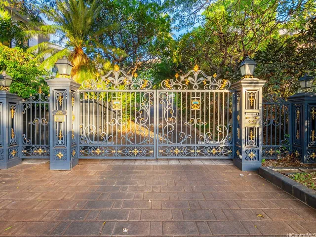 a front view of residential houses with yard