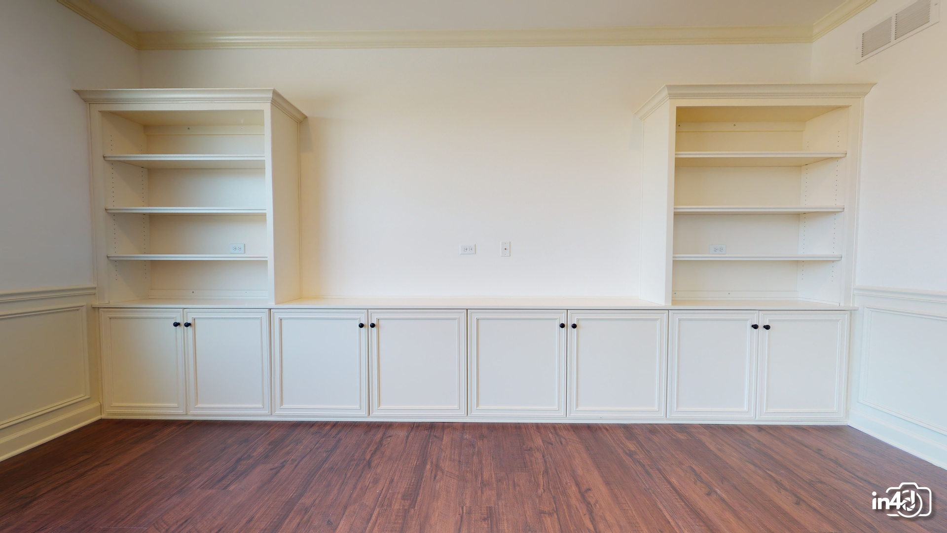 16436 Harmon Lane Plainfield, IL 60586 - Photo 7 of 30 a view of an empty room with empty racks