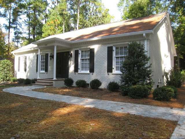 704 Davidson Street Raleigh, NC 27609 - Photo 1 of 12 a view of a house with a yard