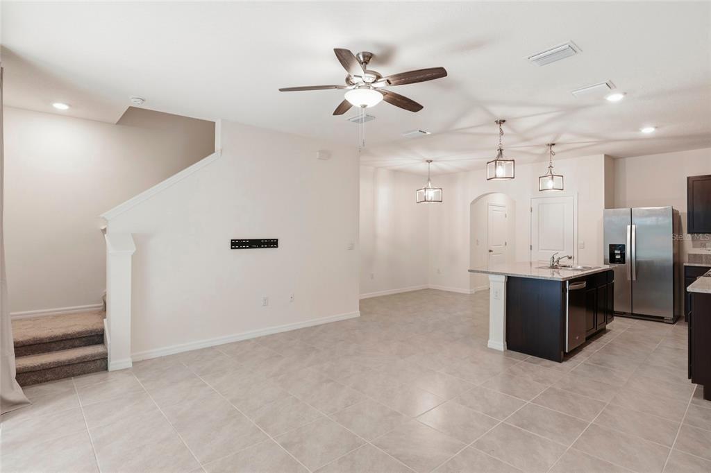 13775 Northwest 9th Road Newberry, FL 32669 - Photo 13 of 33 an empty room with a ceiling fan and a window
