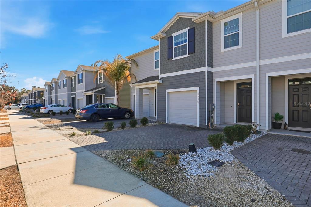 13775 Northwest 9th Road Newberry, FL 32669 - Photo 2 of 33 a view of a building with many windows