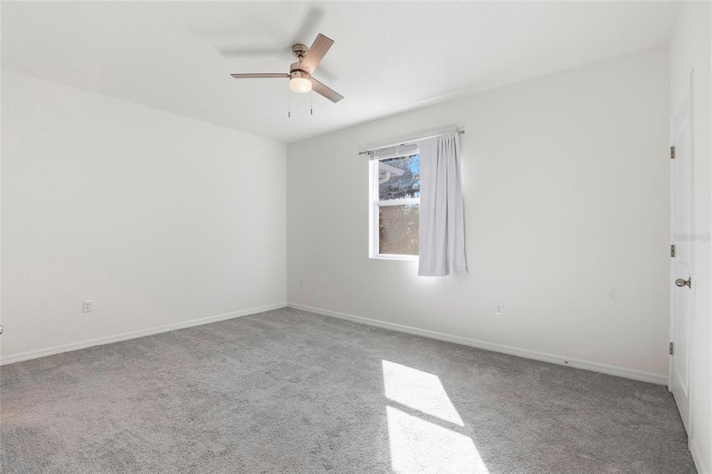 13775 Northwest 9th Road Newberry, FL 32669 - Photo 21 of 33 an empty room with windows