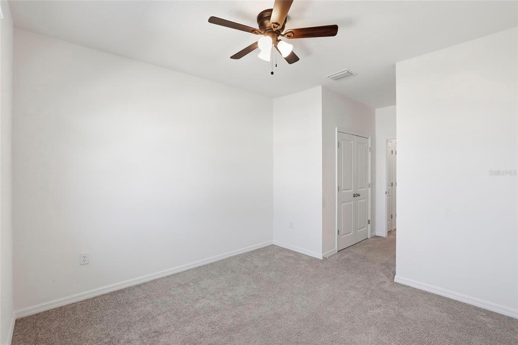 13775 Northwest 9th Road Newberry, FL 32669 - Photo 26 of 33 a view of a room with a ceiling fan