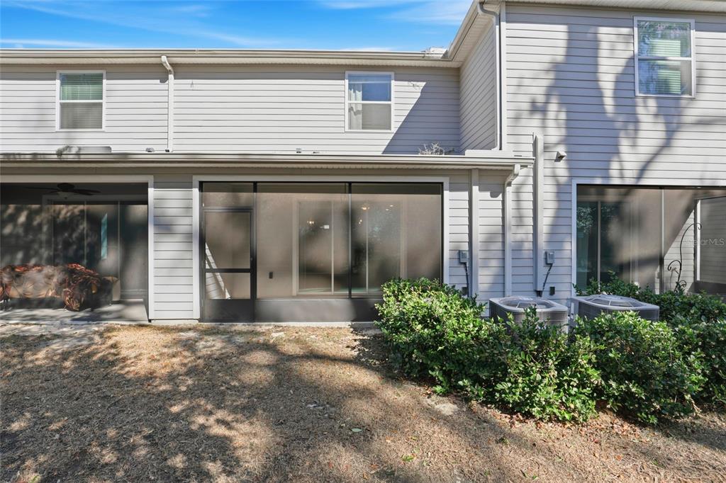 13775 Northwest 9th Road Newberry, FL 32669 - Photo 30 of 33 a view of a brick house with large windows