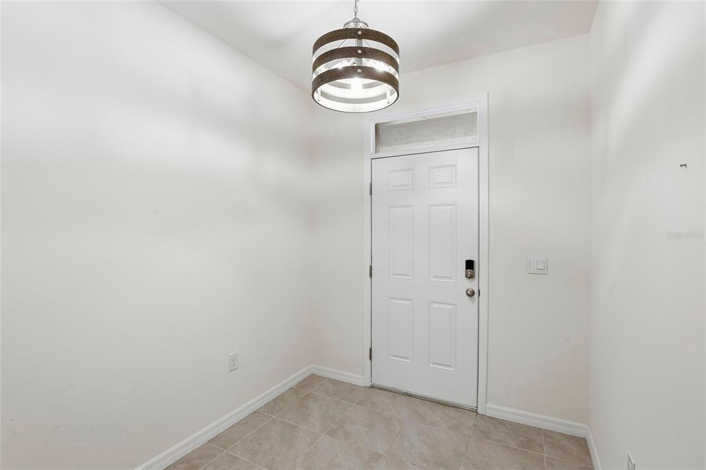 13775 Northwest 9th Road Newberry, FL 32669 - Photo 5 of 33 a view of a chandelier fan in a room