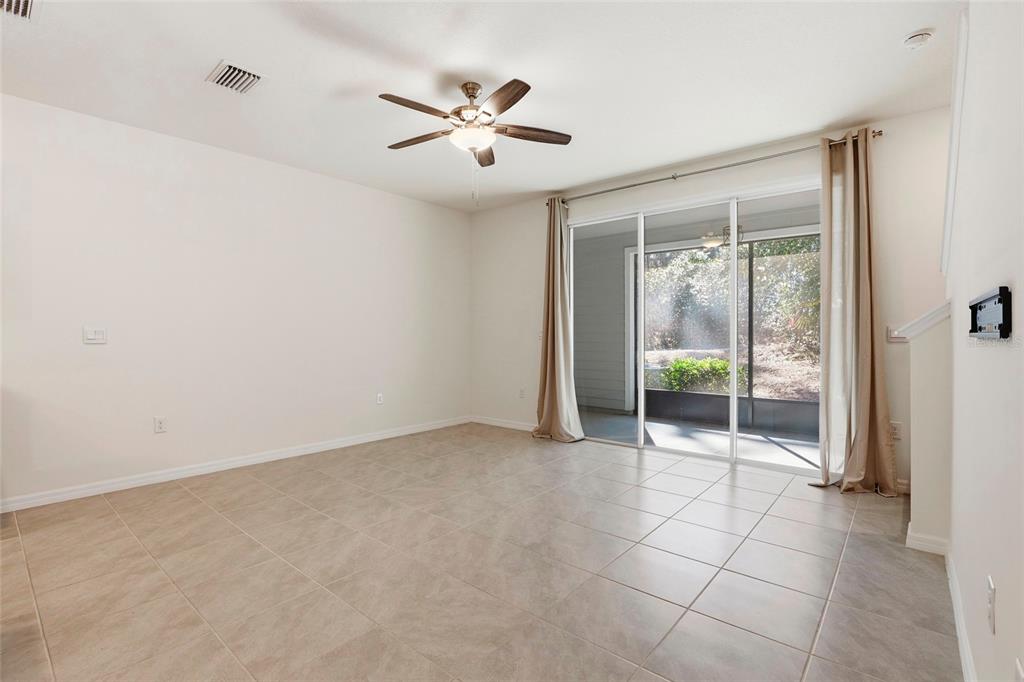13775 Northwest 9th Road Newberry, FL 32669 - Photo 9 of 33 a view of an empty room with a window