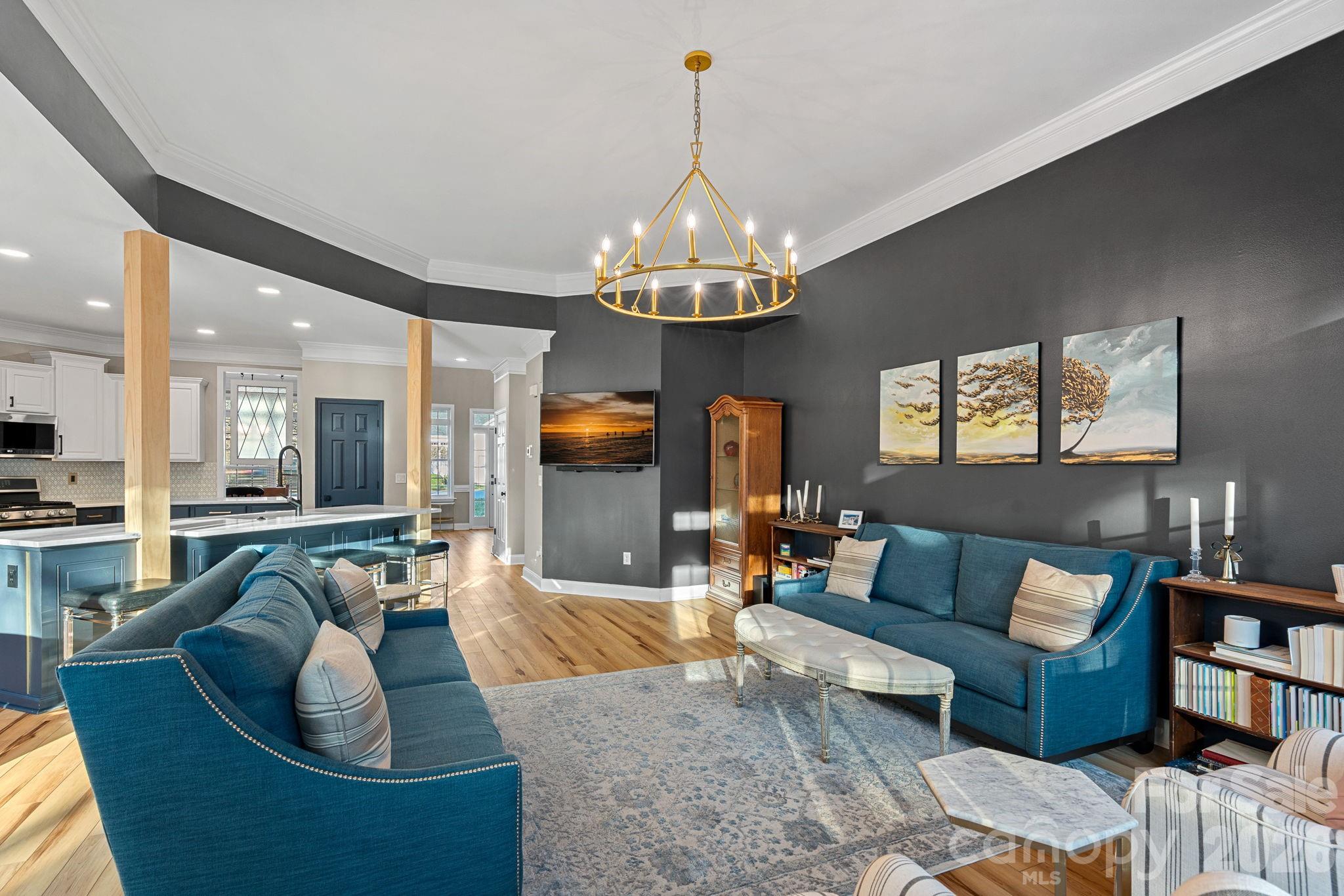 1470 Valhalla Drive Denver, NC 28037 - Photo 11 of 41 a living room with furniture and a chandelier