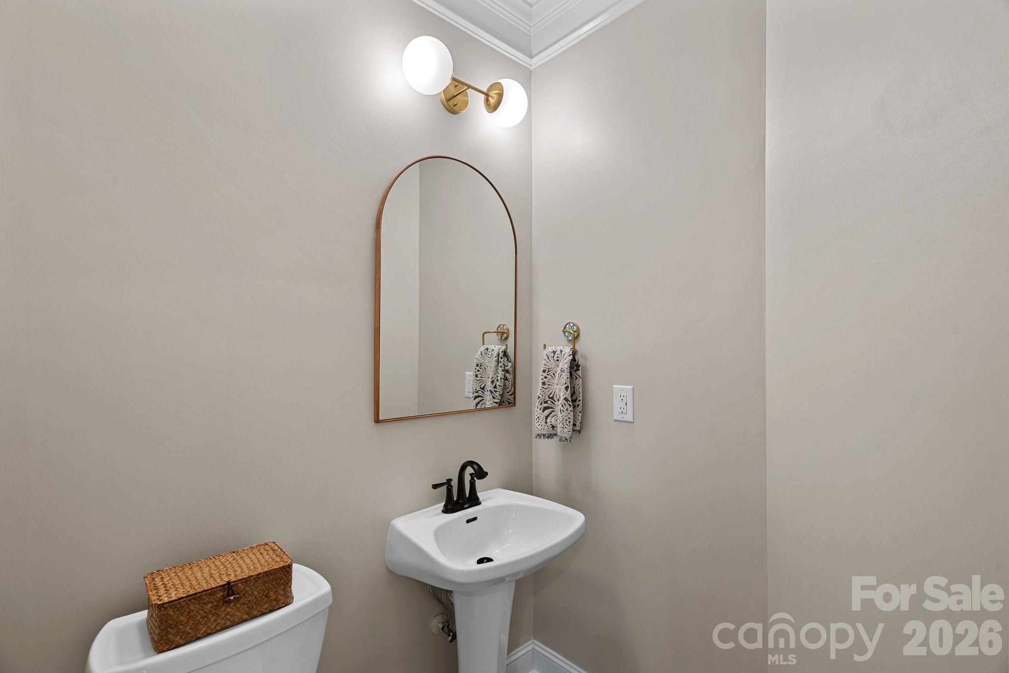 1470 Valhalla Drive Denver, NC 28037 - Photo 15 of 41 a bathroom with a sink and a mirror