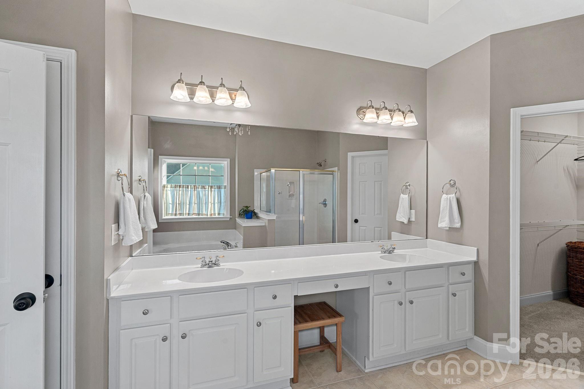 1470 Valhalla Drive Denver, NC 28037 - Photo 18 of 41 a bathroom with double vanity sinks and a mirror