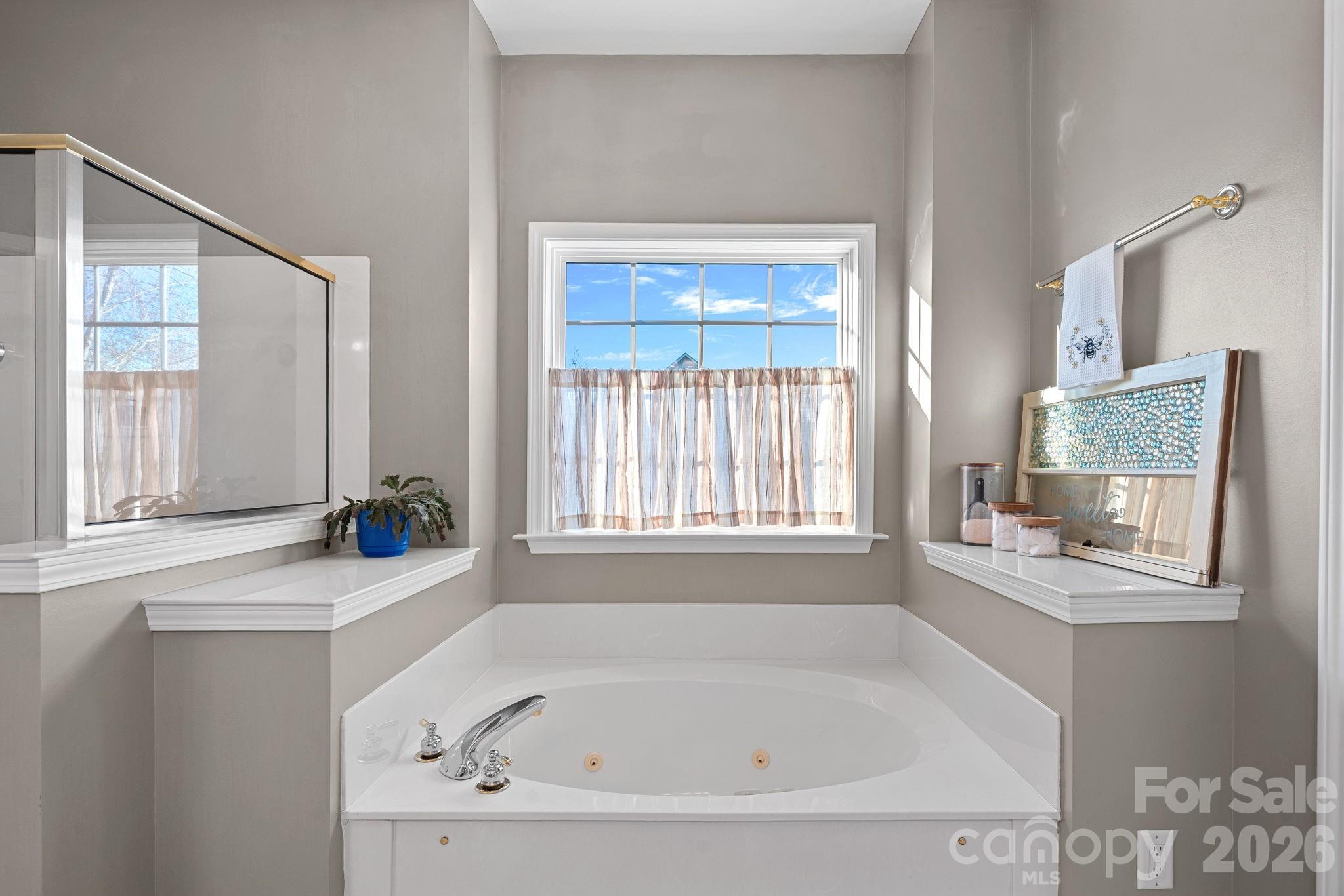 1470 Valhalla Drive Denver, NC 28037 - Photo 19 of 41 a white bath tub sitting next to a window