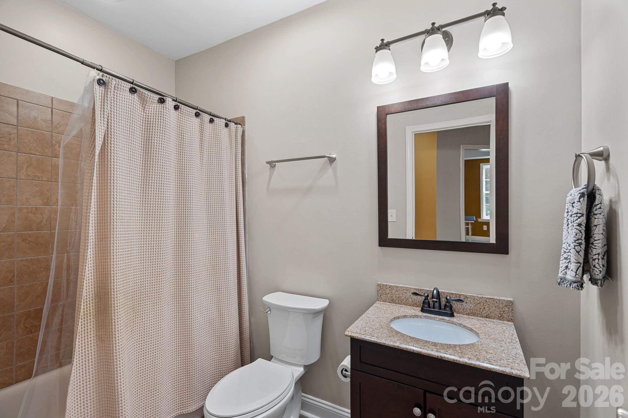 1470 Valhalla Drive Denver, NC 28037 - Photo 29 of 41 a bathroom with a sink vanity and toilet
