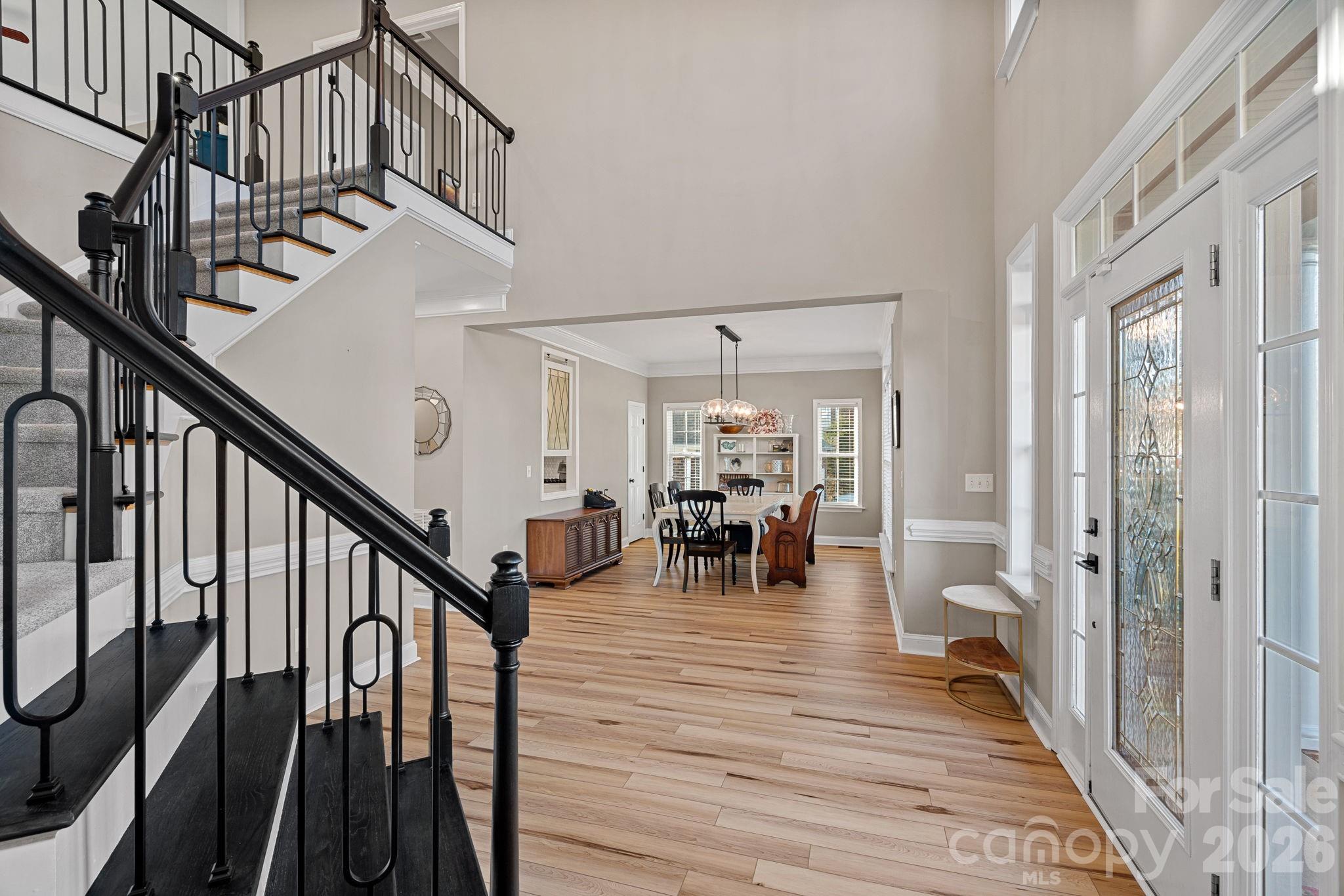 1470 Valhalla Drive Denver, NC 28037 - Photo 3 of 41 a view of entryway and hall with wooden floor