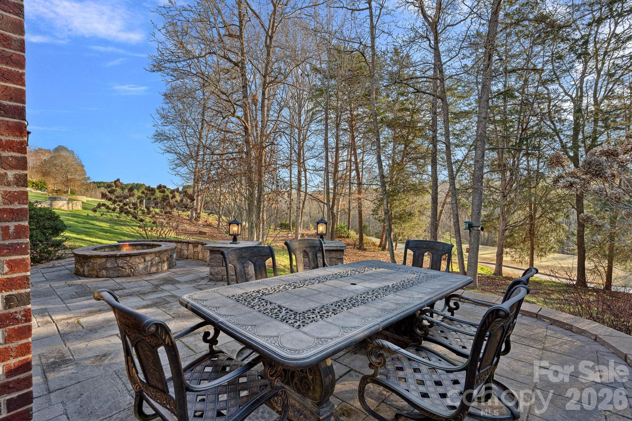 1470 Valhalla Drive Denver, NC 28037 - Photo 33 of 41 a view of a patio with table and chairs and potted plants