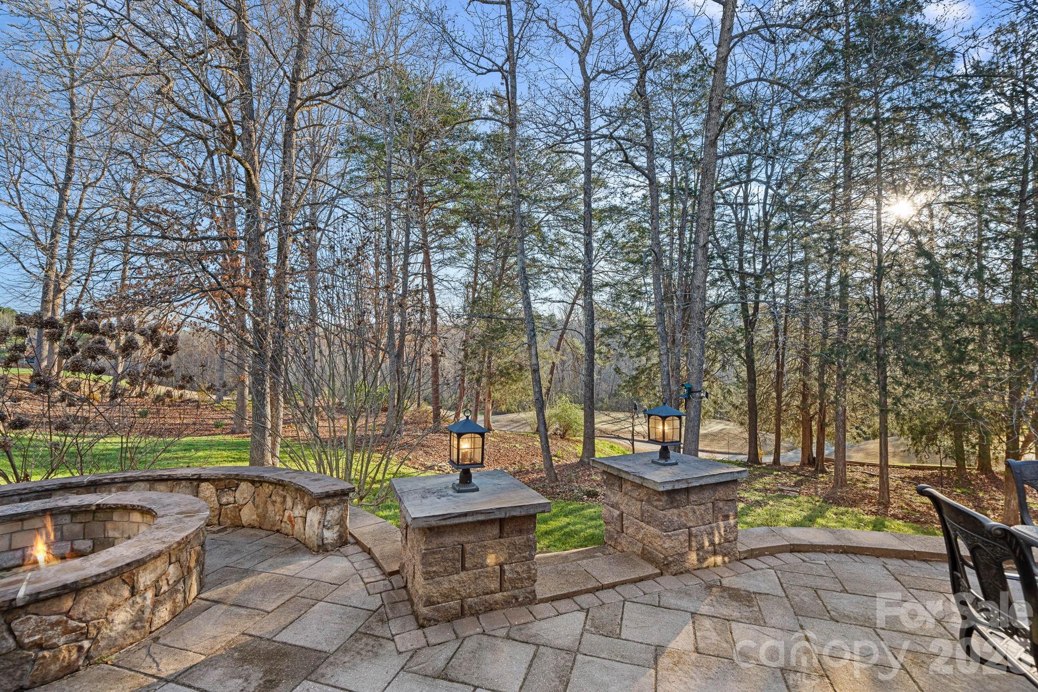 1470 Valhalla Drive Denver, NC 28037 - Photo 34 of 41 a view of a patio with chairs and a table