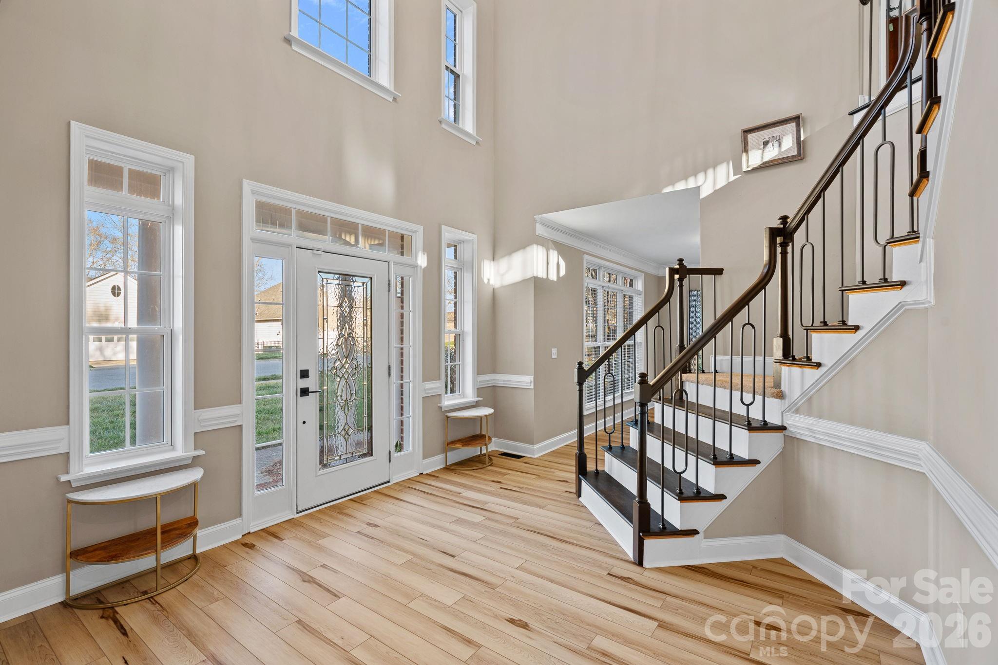 1470 Valhalla Drive Denver, NC 28037 - Photo 8 of 41 a view of entryway and hall with wooden floor