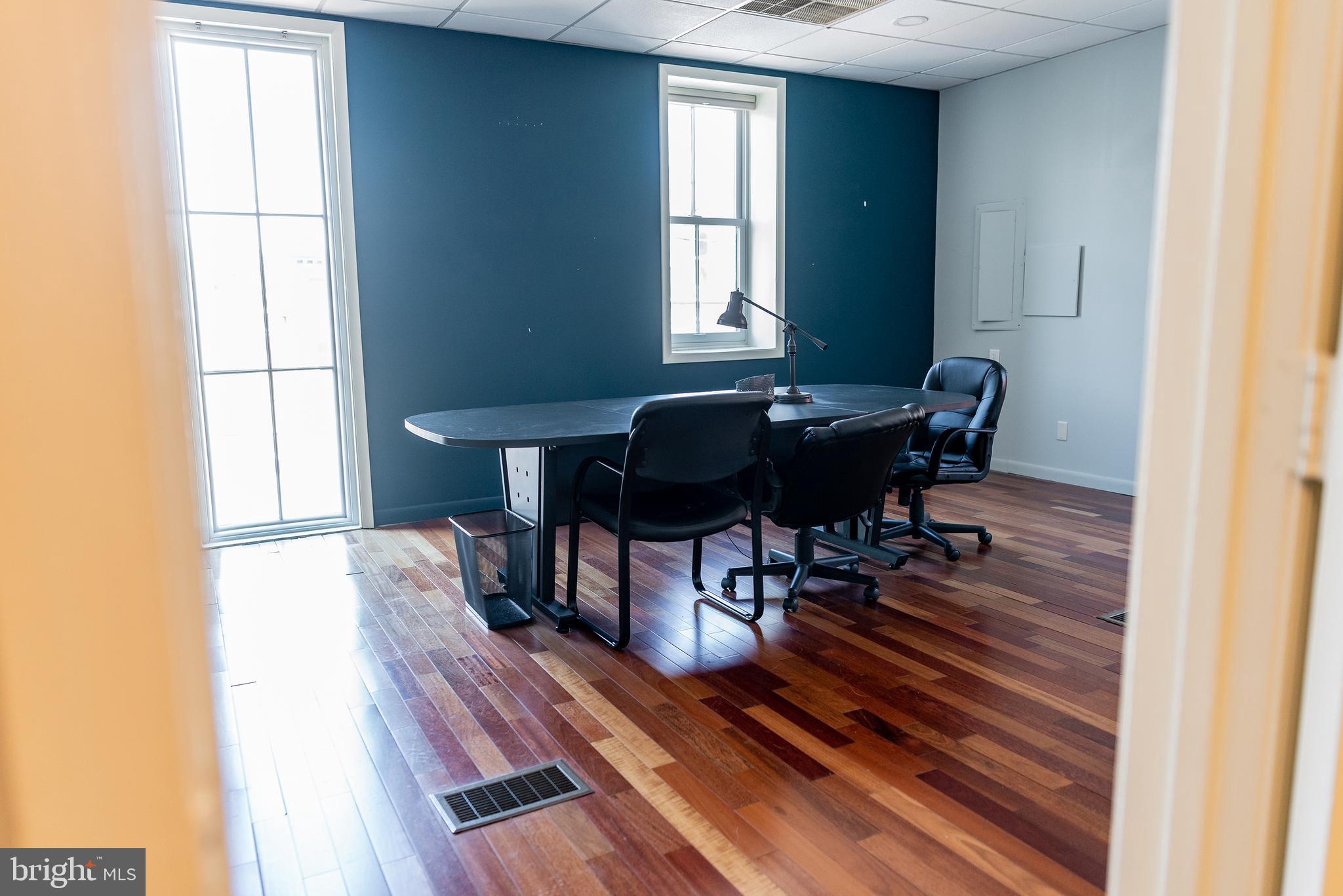 933 Rose Street Harrisburg, PA 17102 - Photo 25 of 98 a view of a dining room with furniture window and wooden floor