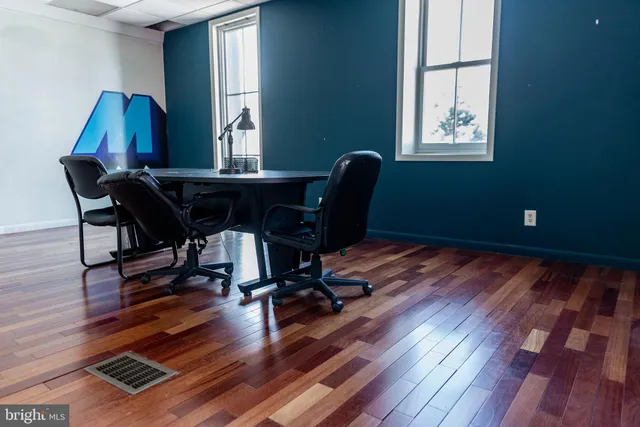 a view of a house with a street