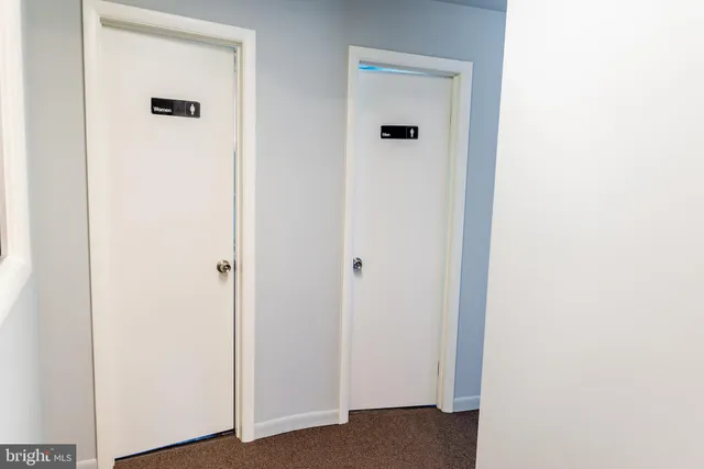 a view of a room with rack on the wall