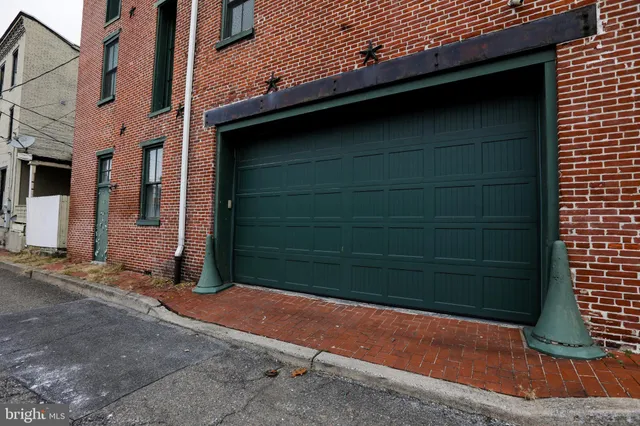 a kitchen with a table and chairs in it