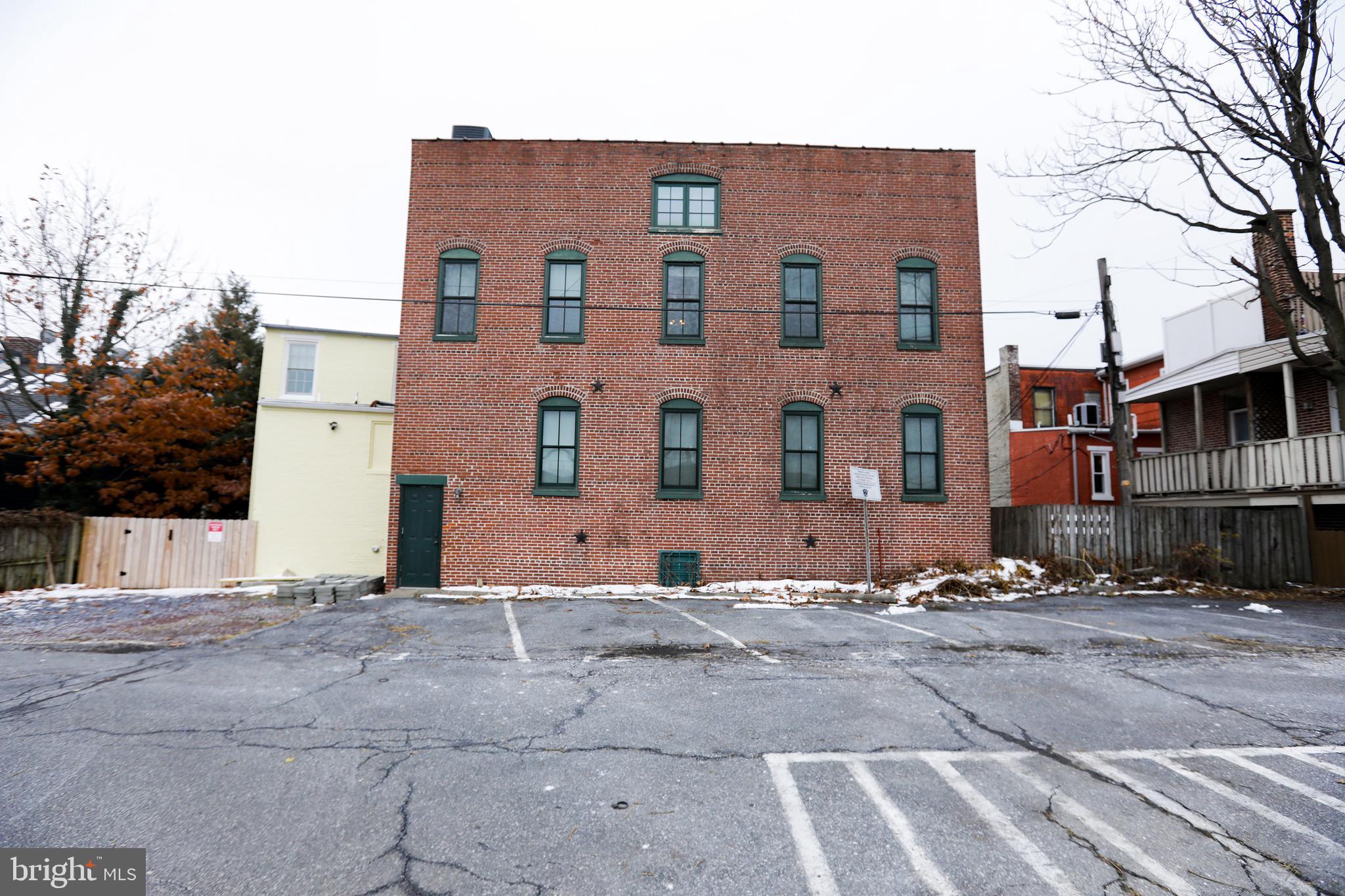 933 Rose Street Harrisburg, PA 17102 - Photo 65 of 98 a front view of a building with a yard