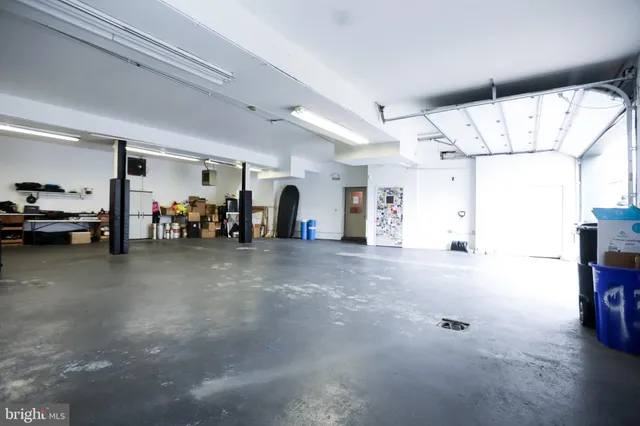 a kitchen with granite countertop stainless steel appliances and wooden cabinets