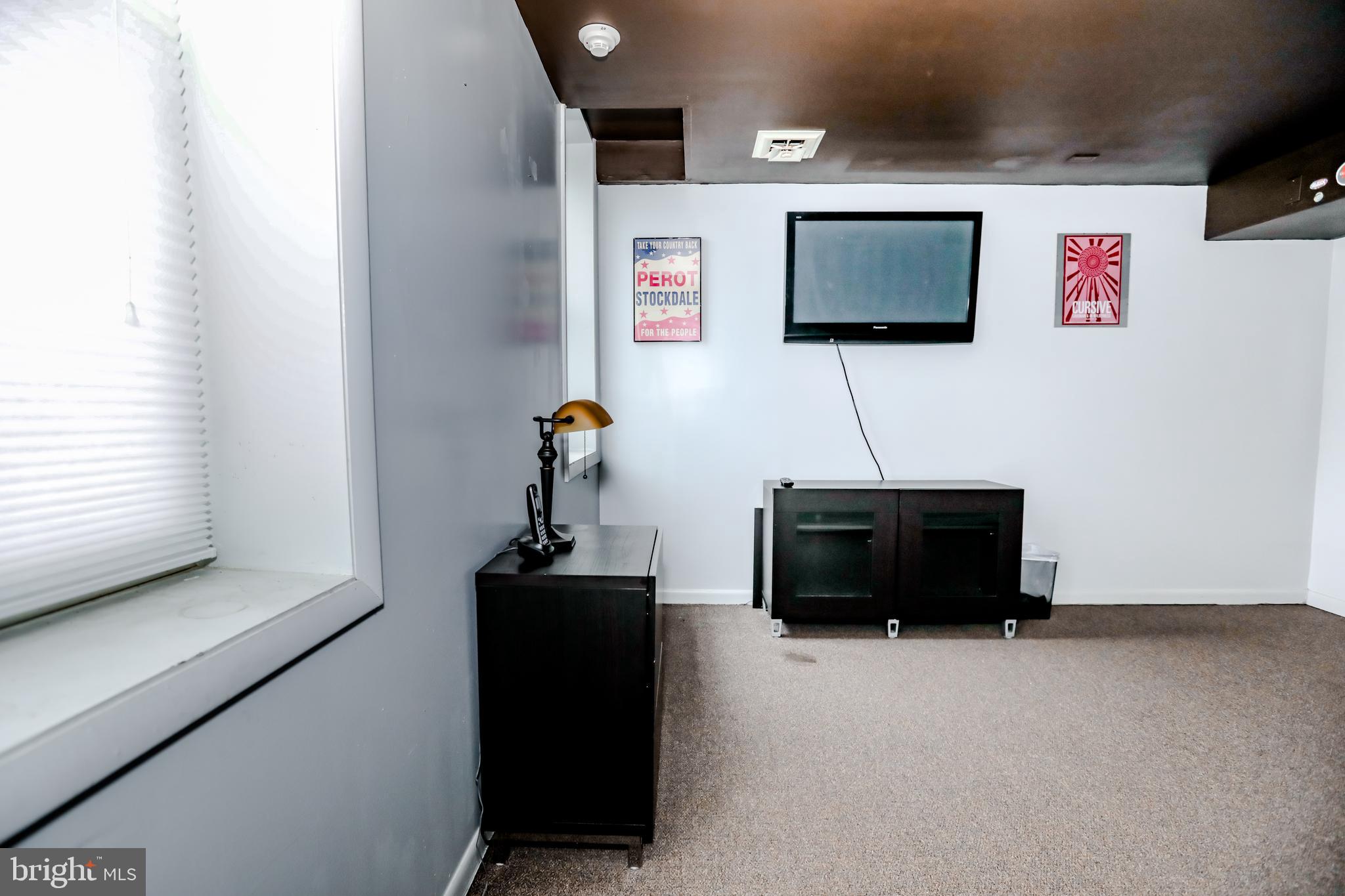 933 Rose Street Harrisburg, PA 17102 - Photo 89 of 98 a living room with furniture and a flat screen tv