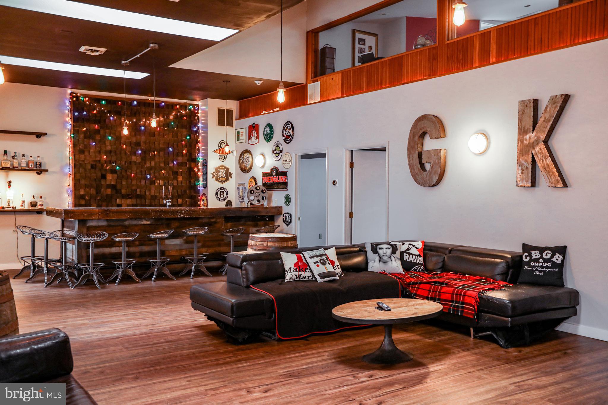 933 Rose Street Harrisburg, PA 17102 - Photo 9 of 98 a living room with furniture and a rug