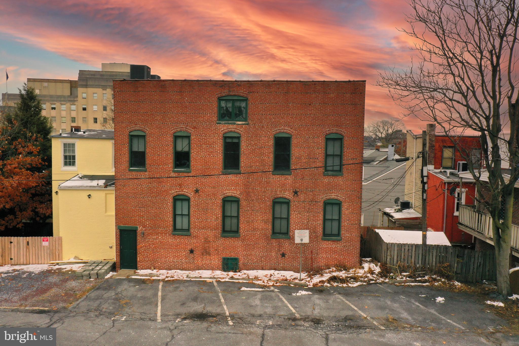 933 Rose Street Harrisburg, PA 17102 - Photo 97 of 98 a front view of a building with a yard