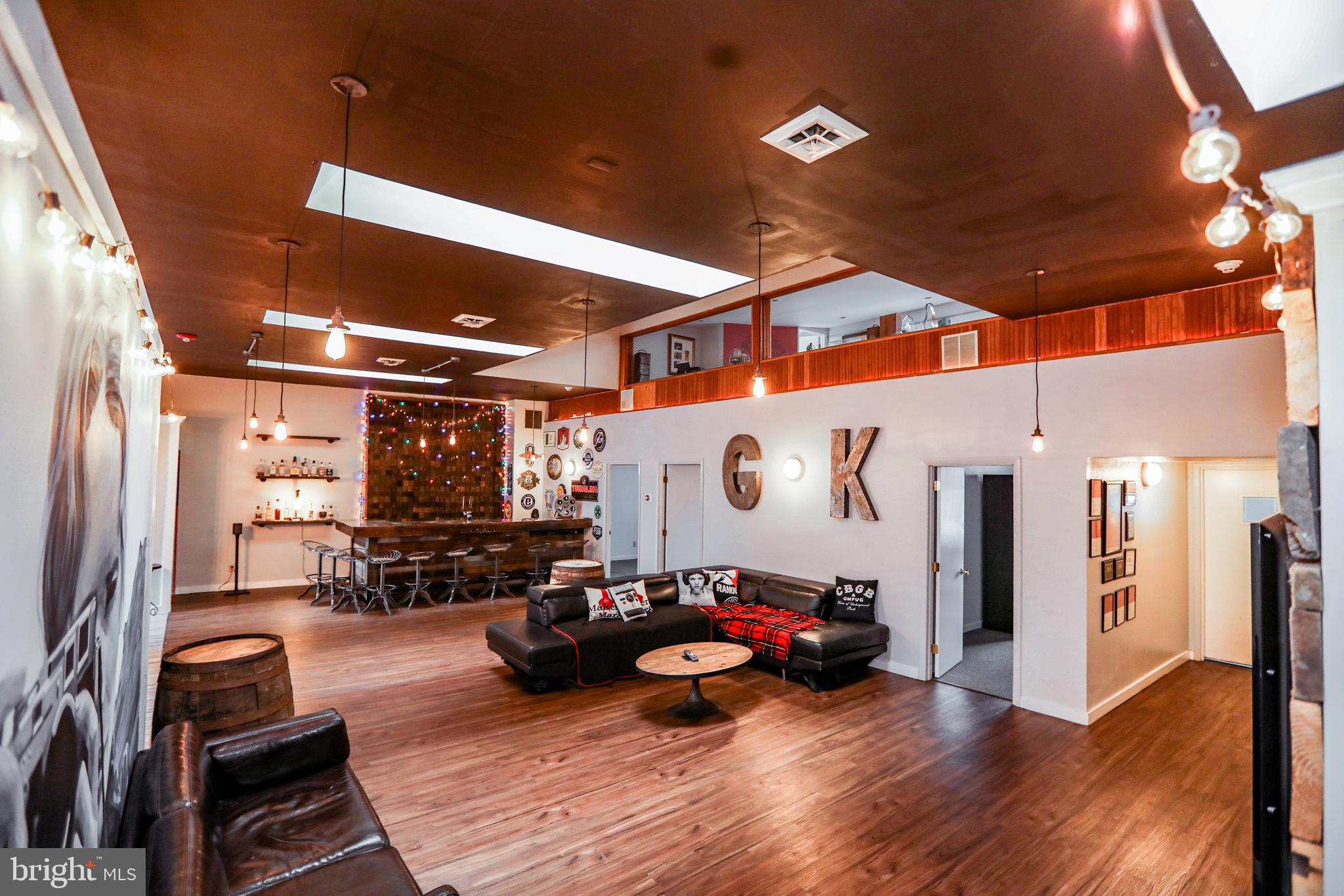 933 Rose Street Harrisburg, PA 17102 - Photo 10 of 98 a living room with furniture and a wooden floor
