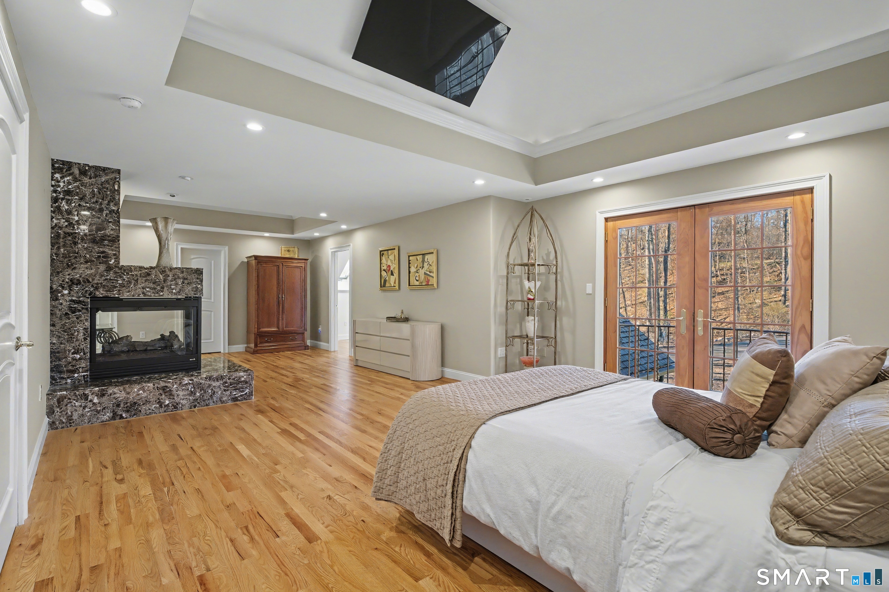 162 Britiani Road Southbury, CT 06488 - Photo 16 of 40 Balcony and fireplace with two walk-in closets