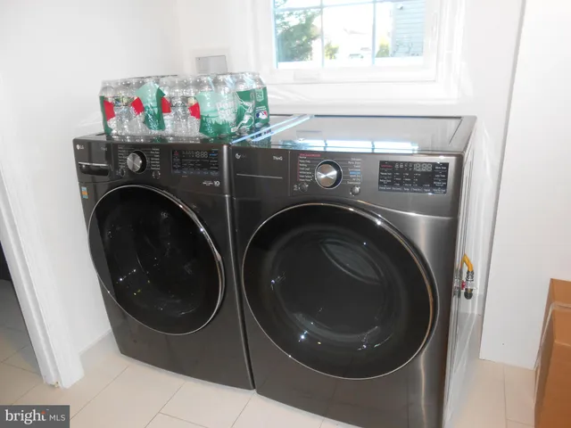 a room with gym equipment and a large window