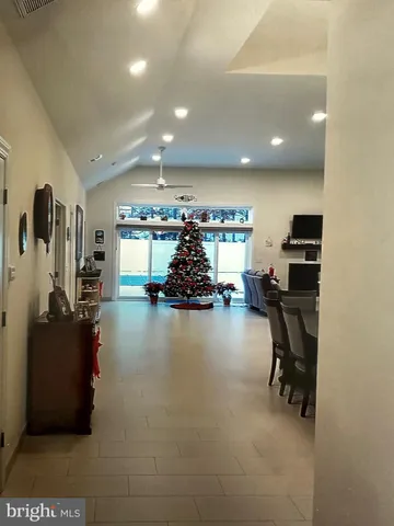 a room with gym equipment and a large window