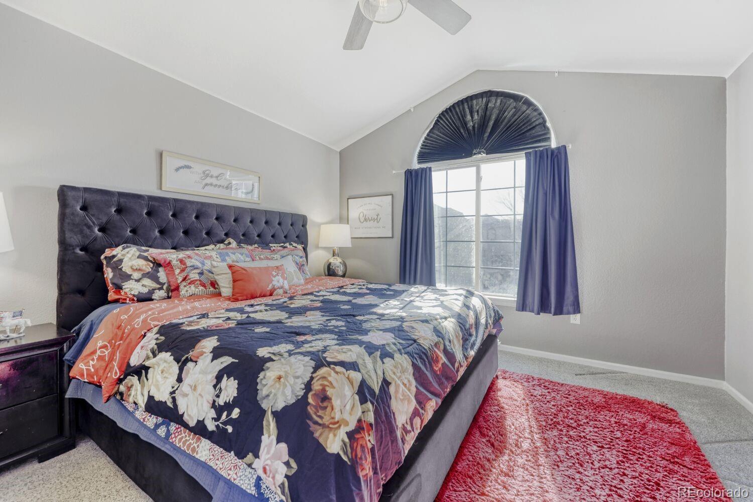 10371 Cook Way, Unit 107 Thornton, CO 80229 - Photo 11 of 34 a bedroom with bed and a window