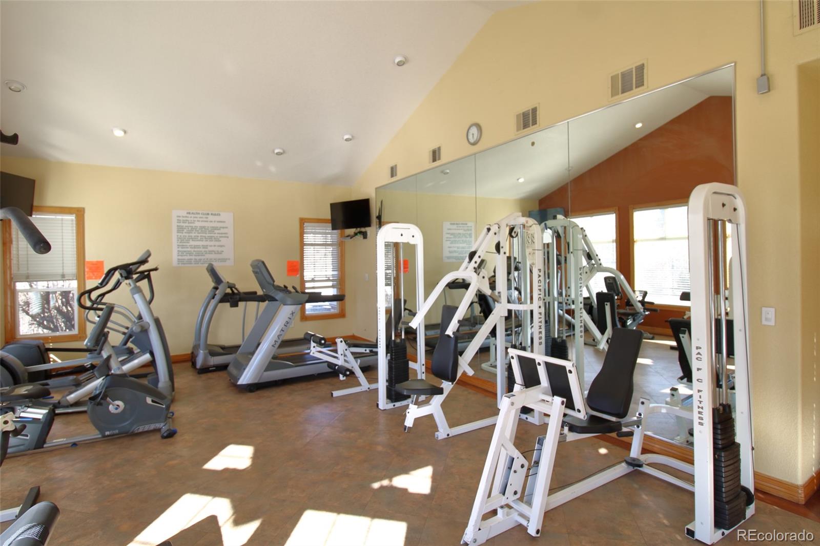 10371 Cook Way, Unit 107 Thornton, CO 80229 - Photo 16 of 34 a view of a room with gym equipment