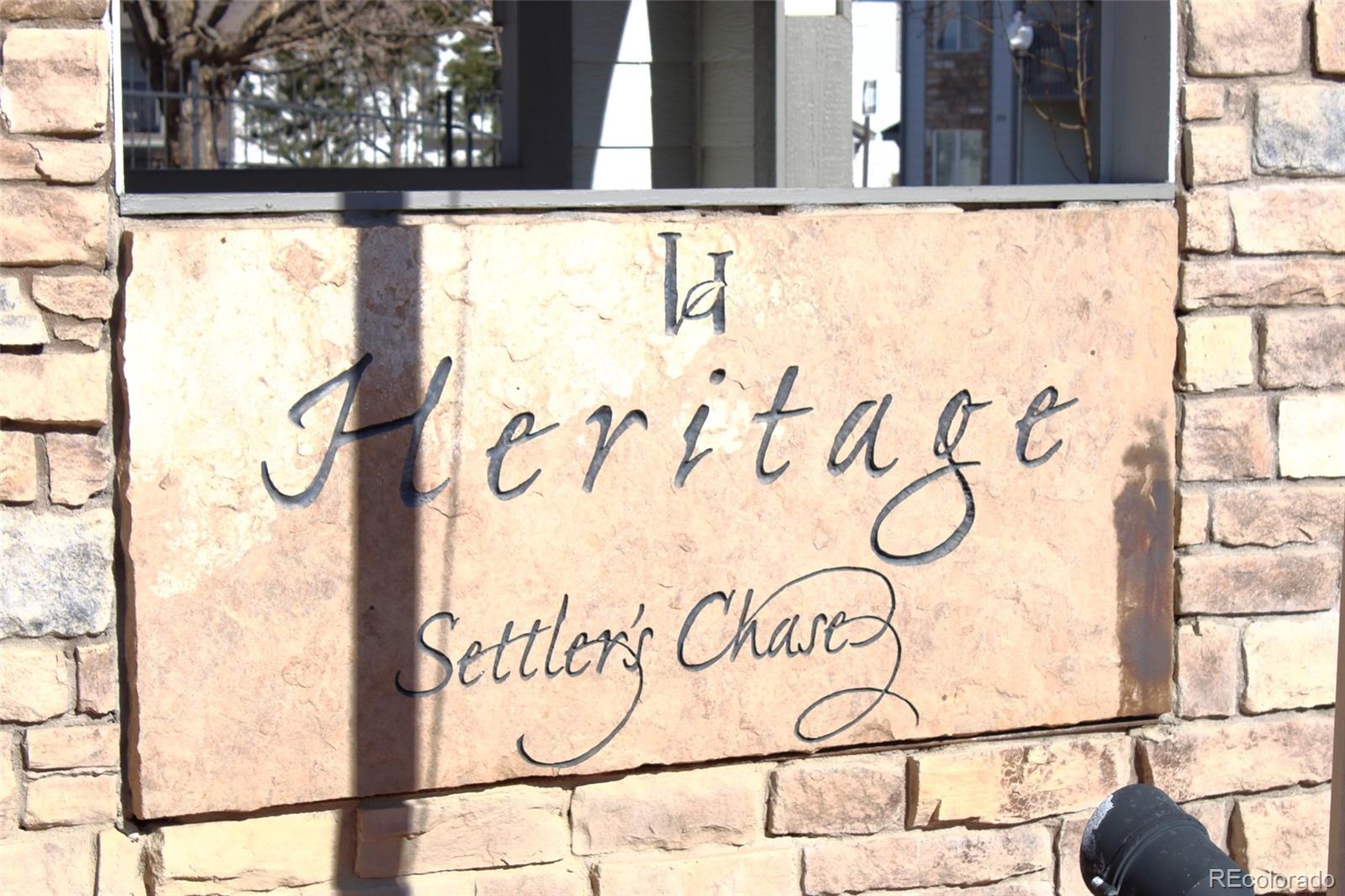 10371 Cook Way, Unit 107 Thornton, CO 80229 - Photo 3 of 34 a close up of a wall with a window