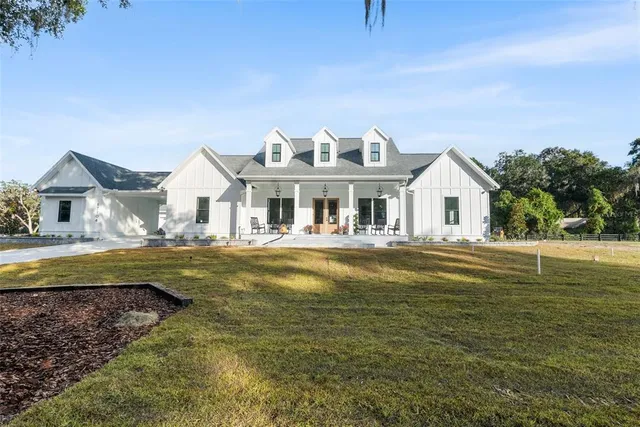 a view of a house with a swimming pool