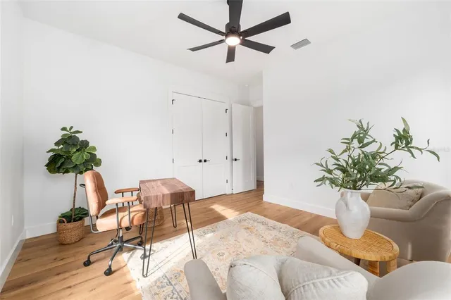 a view of a livingroom with furniture and a livingroom