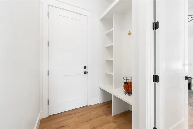 a view of a house with swimming pool and porch