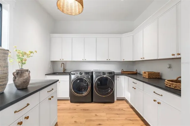 an aerial view of a house with yard swimming pool and outdoor seating