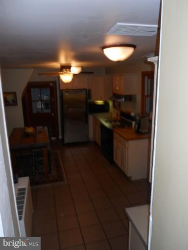 2308 Floral Park Road Clinton, MD 20735 - Photo 14 of 30 a kitchen with a sink and cabinets
