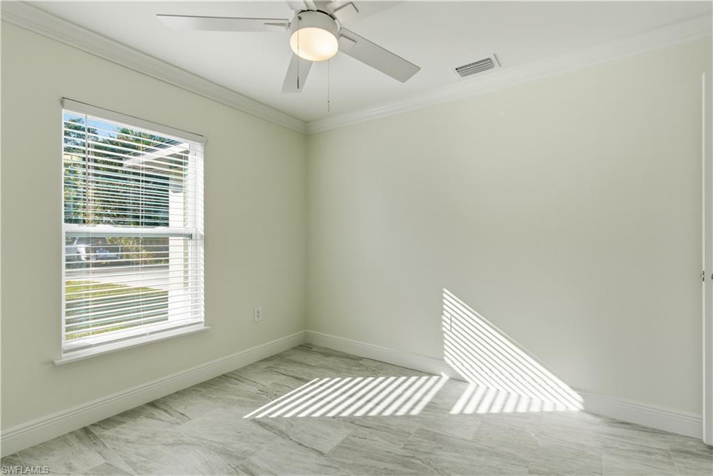 2141 Davis Street Fort Myers, FL 33916 - Photo 26 of 50 a view of an empty room with a window