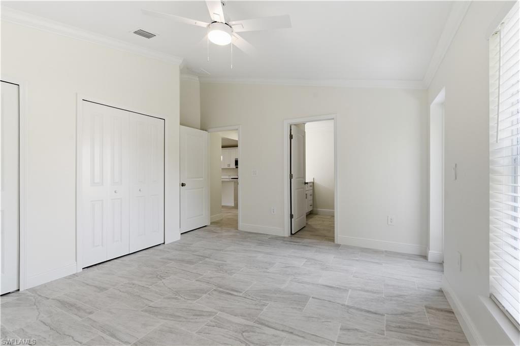 2141 Davis Street Fort Myers, FL 33916 - Photo 36 of 50 a view of an empty room with a window